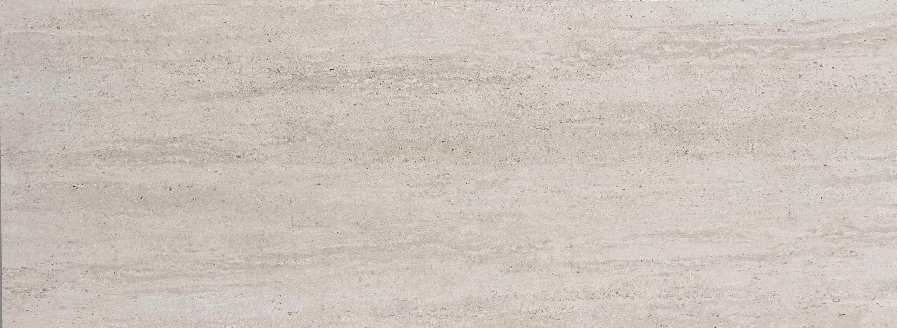 Travertino, a soft stone material with a velvety matte finish.